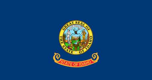 The flag of Idaho featuring the state seal on a blue background with the words "State of Idaho" below.