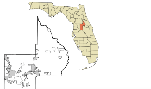 Map highlighting a specific area in Florida, with a focus on a red section within a larger beige outline.
