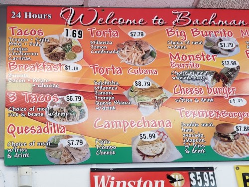 Menu board featuring various Mexican food items like tacos, tortas, burritos, and quesadillas with prices listed.