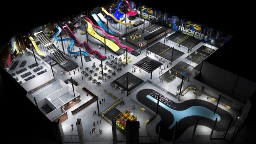 Aerial view of an indoor amusement park featuring slides, climbing areas, and seating spaces.