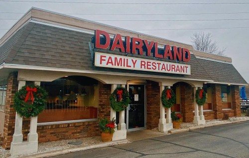 Exterior of Dairyland Family Restaurant, featuring festive wreaths and a welcoming entrance.