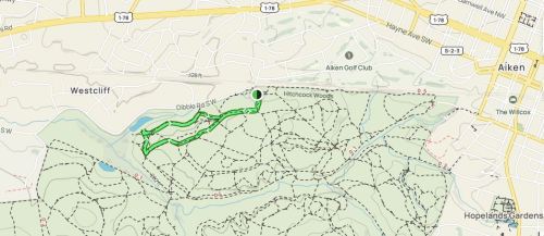 Map showing a trail route in Hitchcock Woods, Aiken, with marked paths and nearby landmarks.