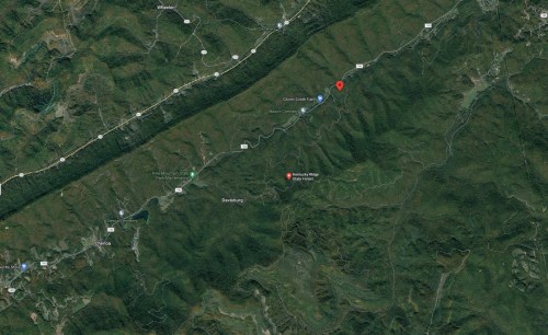 Aerial view of a mountainous area with roads and a marked location near the Kentucky Ridge State Forest.