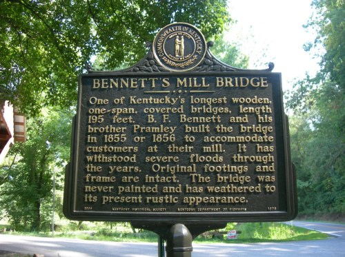 Historical marker for Bennett's Mill Bridge in Kentucky, detailing its construction and resilience against floods.