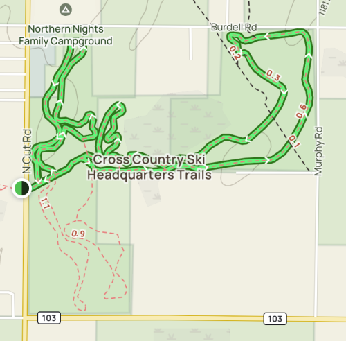 Map of Cross Country Ski Headquarters trails, showing various routes and distances in a green and red color scheme.
