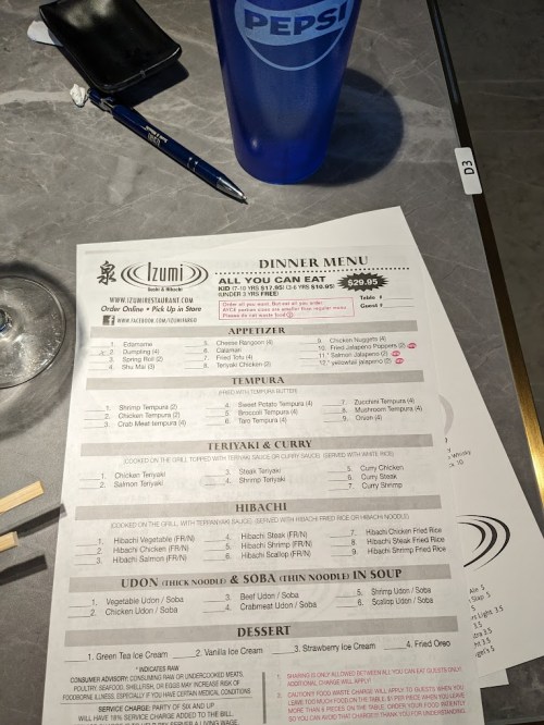 Dinner menu from Izumi restaurant featuring appetizers, tempura, teriyaki, hibachi, and dessert options.
