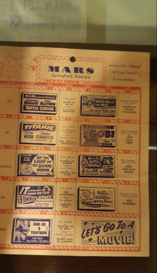 A vintage movie schedule from Mars Theatre in Springfield, Georgia, featuring classic films and showtimes.
