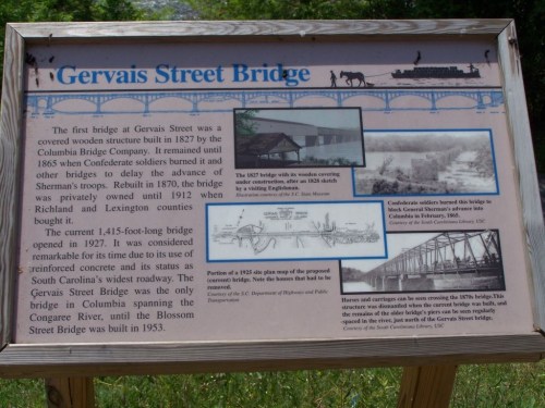 Historical sign about Gervais Street Bridge, detailing its construction, significance, and restoration history.