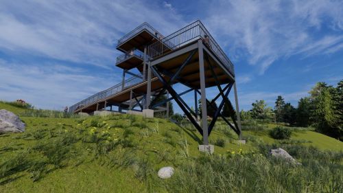 A modern observation tower on a grassy hill, surrounded by trees and blue sky, with a wooden deck and metal supports.