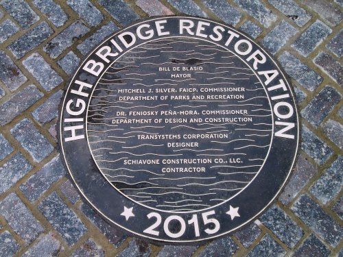 Plaque commemorating the High Bridge Restoration, listing officials and contractors involved, dated 2015.