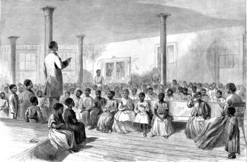 A historical illustration of a large group of children seated in a classroom, listening to a teacher at the front.