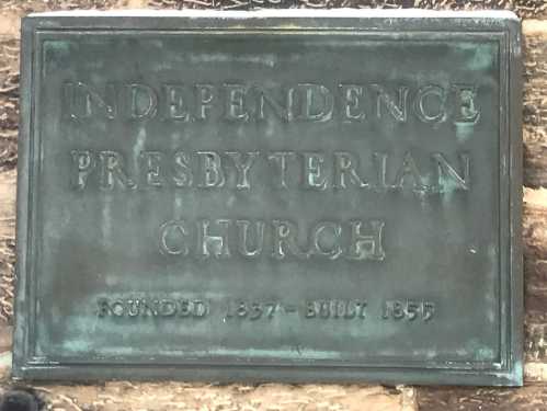 Bronze plaque reading "Independence Presbyterian Church, Founded 1834, Built 1857."