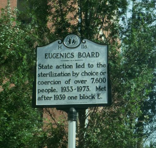 Historical marker for the Eugenics Board, noting forced sterilizations of over 7,600 people from 1933 to 1973.
