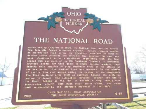 Historical marker for the National Road in Ohio, detailing its significance and development in the early 1800s.