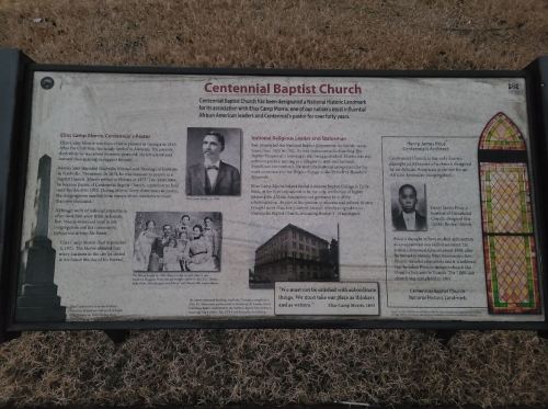 Sign for Centennial Baptist Church, detailing its history and significance in the African American community.