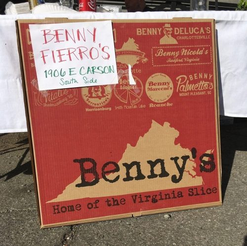 Sign for Benny's, featuring "Home of the Virginia Slice," with location details and logos from various Benny's locations.