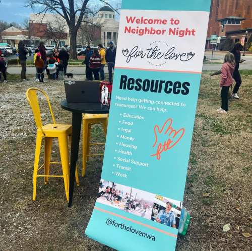 A banner for "Neighbor Night" with resources listed, surrounded by people in a community gathering.