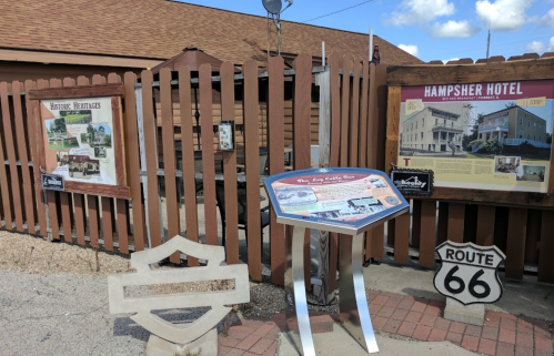 Historic signage and displays at the entrance of the Hampshire Hotel, featuring Route 66 memorabilia.