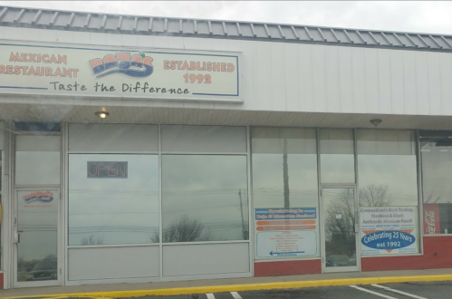 Exterior of Bob's Mexican Restaurant, featuring a sign that reads "Taste the Difference" and "Open," established in 1992.
