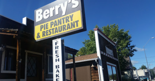 Sign for Berry's Pie Pantry & Restaurant, featuring "Fresh Baked" and a clear blue sky in the background.