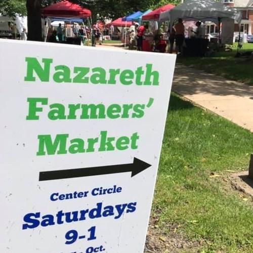 Sign for Nazareth Farmers' Market, indicating location and hours: Saturdays, 9 AM to 1 PM, at Center Circle.