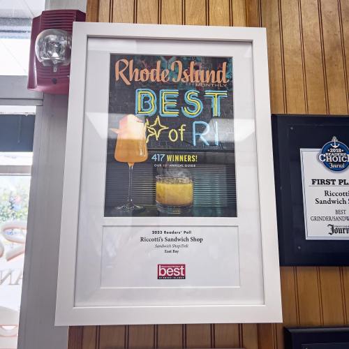 Framed award certificate for Riccotti's Sandwich Shop, highlighting it as a 2023 Reader's Poll winner in Rhode Island.