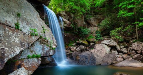 Eagle Falls waterfall in Cumberland, Kentucky, surrounded by rocks and trees