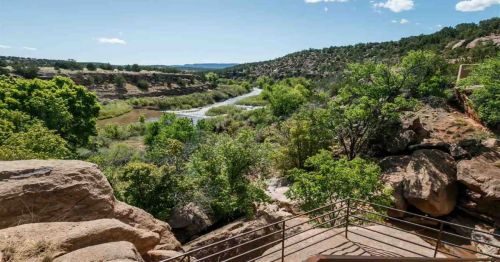 Overlook on the back patio of a New Mexico house with the Pecos River below