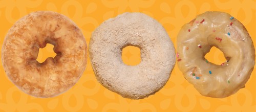 Three donuts on an orange background: one glazed, one powdered, and one with sprinkles.