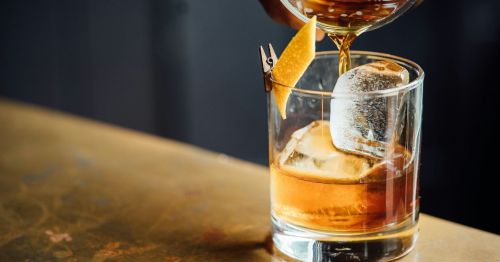 Pouring a glass of whiskey in Arkansas