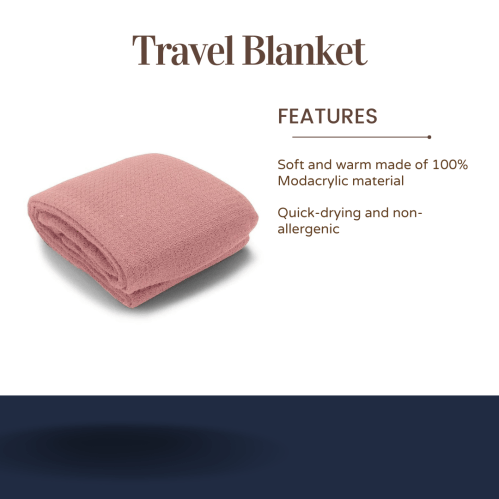 A folded pink travel blanket made of 100% modacrylic, soft, warm, quick-drying, and non-allergenic.