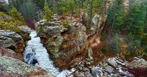 Aerial view of the frozen Jemez Falls in Jemez Springs, New Mexico, during the winter