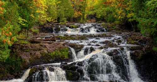 Waterfalls in Copper Falls State Park in northern Wisconsin surrounded by fall foliage.