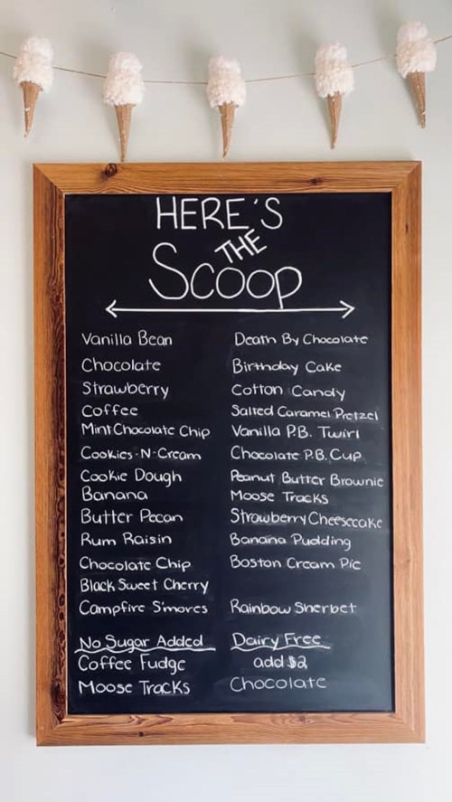 Chalkboard menu listing various ice cream flavors, including Vanilla Bean, Chocolate, and Birthday Cake.