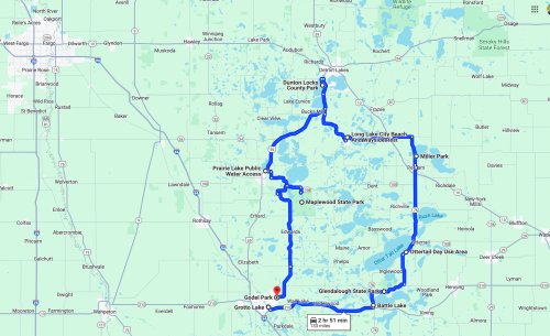 Map showing a route through various parks and lakes, including Gredel Park and Long Lake City Beach, in a green area.