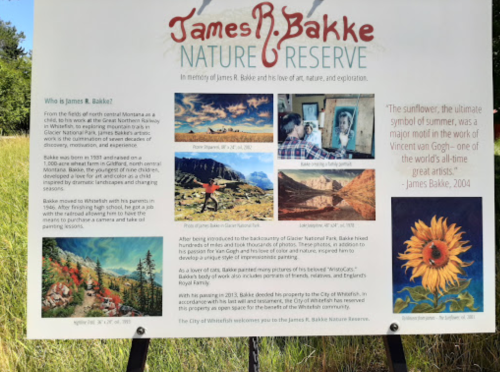Sign about James R. Bakke Nature Reserve, featuring images and text about his life, work, and contributions to nature.