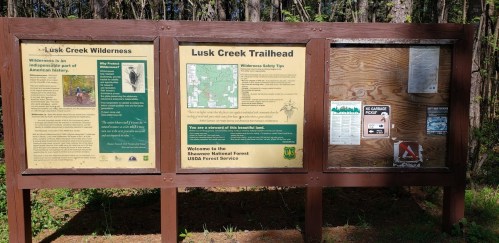 Information board at Lusk Creek Trailhead, featuring maps, safety tips, and details about Lusk Creek Wilderness.