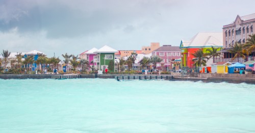colorful buildings surround nassau harbor in the bahamas