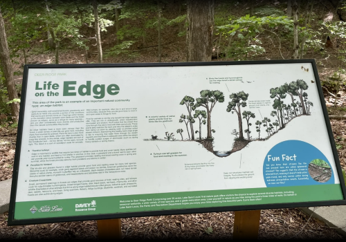 Sign at a park titled "Life on the Edge," explaining an important natural community and its ecosystem.