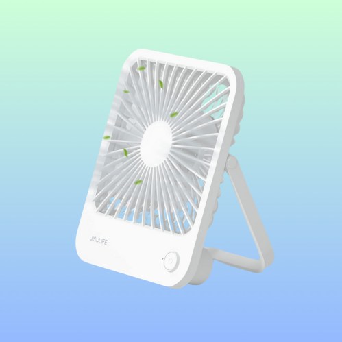 A white portable fan with a stand, featuring a circular design and green accents, set against a gradient background.