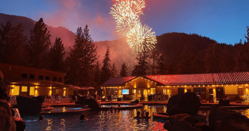 fireworks above a building on a lake