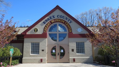 Front view of the Essex County Cherry Blossom Center, featuring a large entrance and decorative signage.