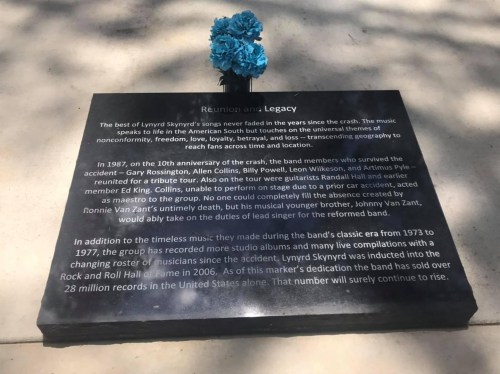 A plaque commemorating Lynyrd Skynyrd's legacy, detailing the band's history and the 1977 plane crash.