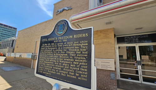 A historical marker about the Civil Rights Freedom Riders, detailing their journey and purpose in 1961.