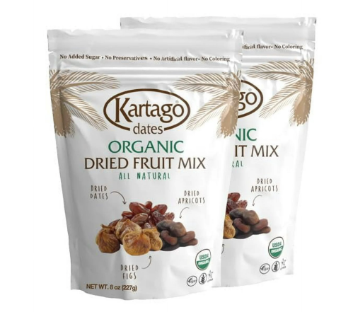 Two bags of Kartago Organic Dried Fruit Mix, featuring dried dates, figs, and apricots, labeled as all-natural and USDA organic.