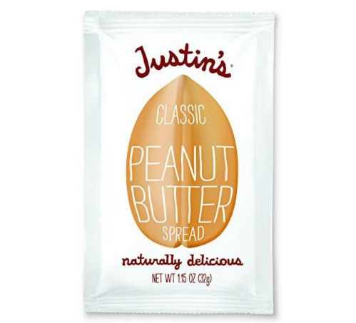 A packet of Justin's Classic Peanut Butter Spread, labeled "naturally delicious," weighing 1.5 oz.