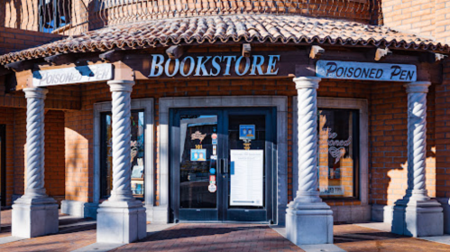 Entrance of a bookstore named "Poisoned Pen," featuring decorative columns and a tiled roof.