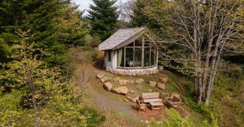 A stone house in the middle of the woods near Mount Baker, Washington