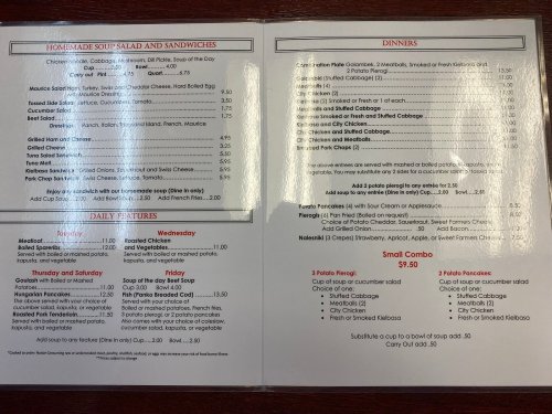 Menu featuring homemade soups, salads, sandwiches, and dinner options with daily specials listed.