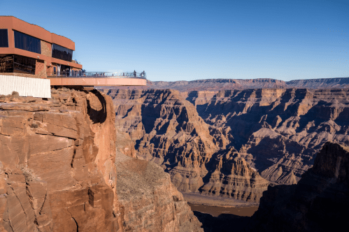 Visitors on the Skywalk glass observation bridge at Grand Canyon West Rim in Arizona